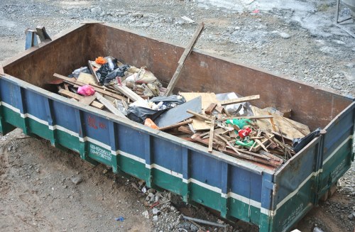 Westminster skip hire truck outside a terrace house