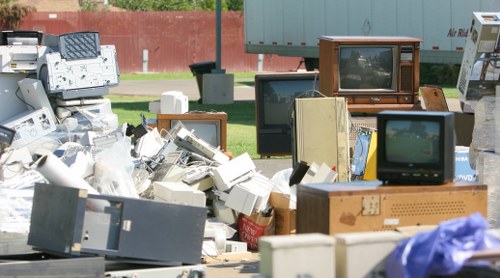 Waste clearance truck at a construction site
