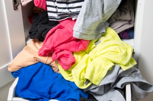 Workers sorting materials at a local transfer station